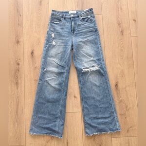 Risen wide leg jeans, distressed with raw edge hem, size 5/27